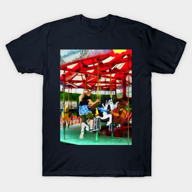 Carnival Midway - Girl Getting on Merry-Go-Round T-Shirt by SusanSavad